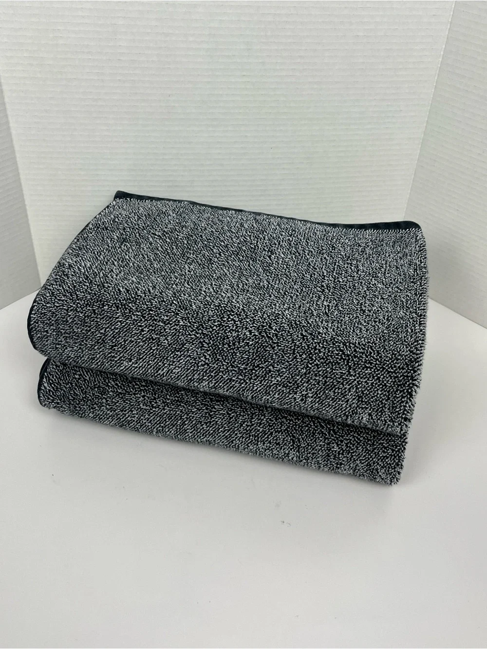 Set of 2 Brooklinen Turkish Cotton Classic Bath Towel in Marled Black.